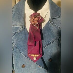 Elegant Purple Tie with Floral Brooch